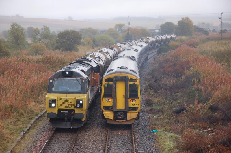 Keith this morning: This is 70810 with 124 loaded carbonate tanks from Waterloo Quay for Caledonian Paper at Irvine, writing for the 09.01 from Inverness to pass with 158717 on the back - which was the first 158? Photo of Keith this morning