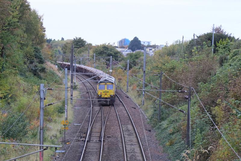 686E 6K??: 66597 on the rear of 6K?? 08.21 Millerhill to Portobello crossing from the Down to the Up line at Craigentinny on 17/10/2020. Down line relaid at the site of St Margarets TMD Photo of 686E 6K??