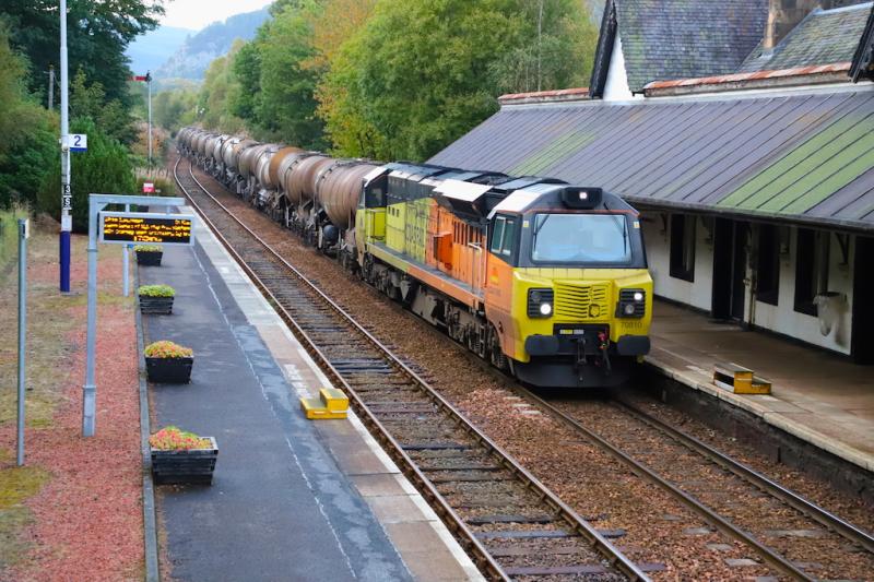 70 810 at Dunkeld & Birnam station.: 70 810 passes Dunkeld and Birnam station on 6Z40 0615 Aberdeen Waterloo to Irvine Caledonian Paper.
Date : 2nd October 2020. Photo of 70 810 at Dunkeld & Birnam station.