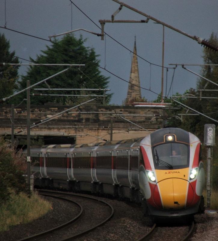 800105: 800105 curves around the corner at Brunstane farm with a service for London Photo of 800105