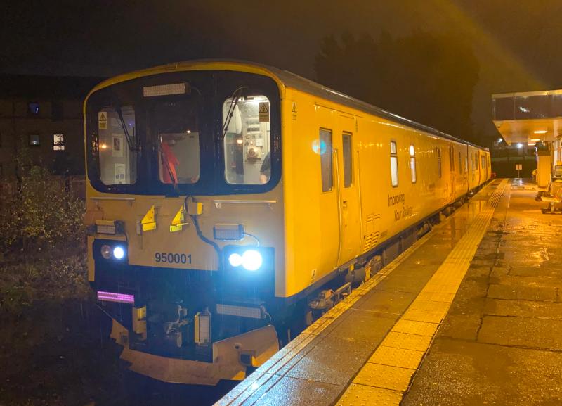 Bitesized Banana: Network Rail's Track Recording DMU 950001, is seen at a standstill at East Kilbride as the driver changes ends to continue the journey of 2Q08 Carlisle - Mossend. Photo of Bitesized Banana