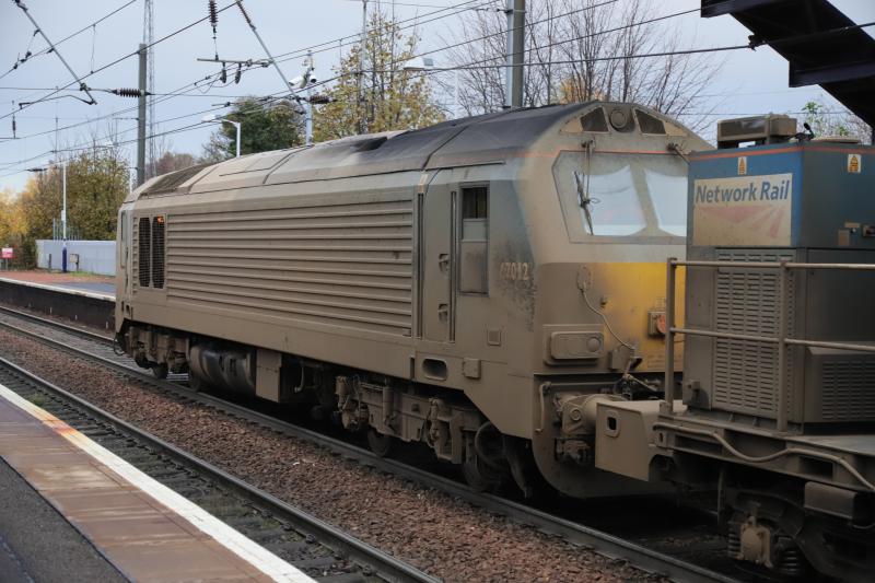 67012 non camera cab end: 67012 non camera cab end covered in dirt. The 2 shades of grey on the sides and yellow on the cab covered on 10/11/2020 Photo of 67012 non camera cab end