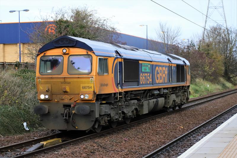 66754: 66754 passing Brunstane Station on 0Z10 10.03 Craigentinny to Elderslie Route Learner on 17/11/2020 Carnforth Shed Code 10A written in the Dirt Photo of 66754