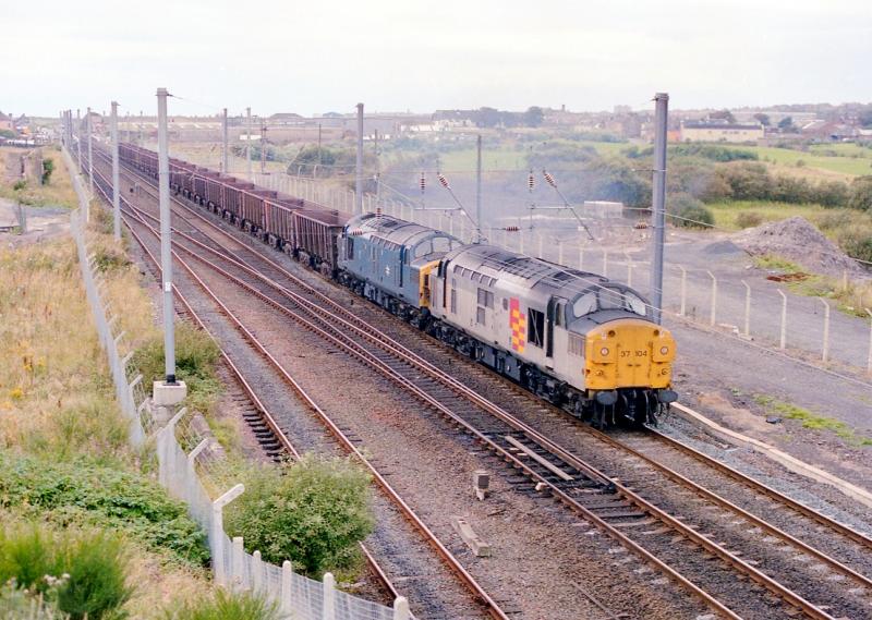 37104 Iron ore: 37104 on Ravenscraig iron ore working. Photo of 37104 Iron ore