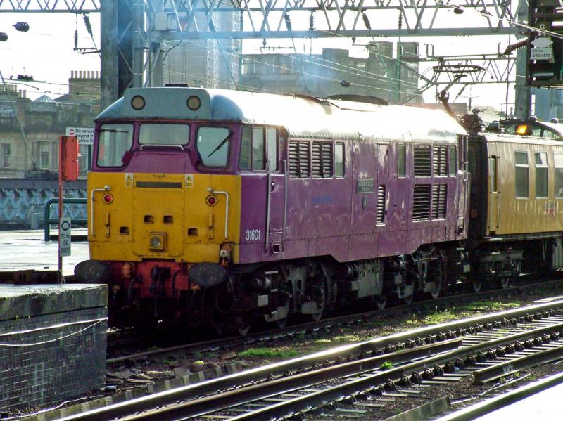 31601 at Glasgow Central: Wearings its unique purple livery 31601 waits at Glasgow Central with the Mentor OHL Inspection Train on 24th January 2008 Photo of 31601 at Glasgow Central