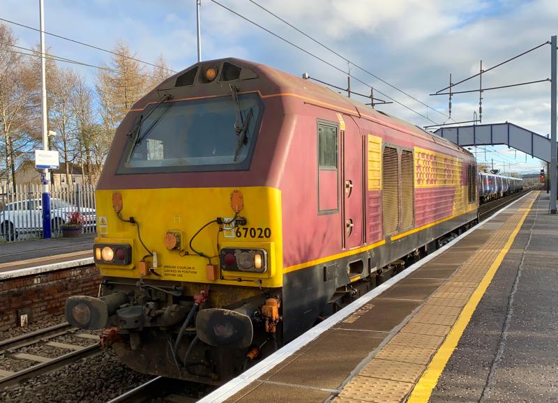Spray Season is Over: Moving to Mossend after dropping off the RHTT set from 3S93 at Millerhill, 67020 is seen crawling through Holytown before it was due to head back south on the morning of 17/12/2020 Photo of Spray Season is Over