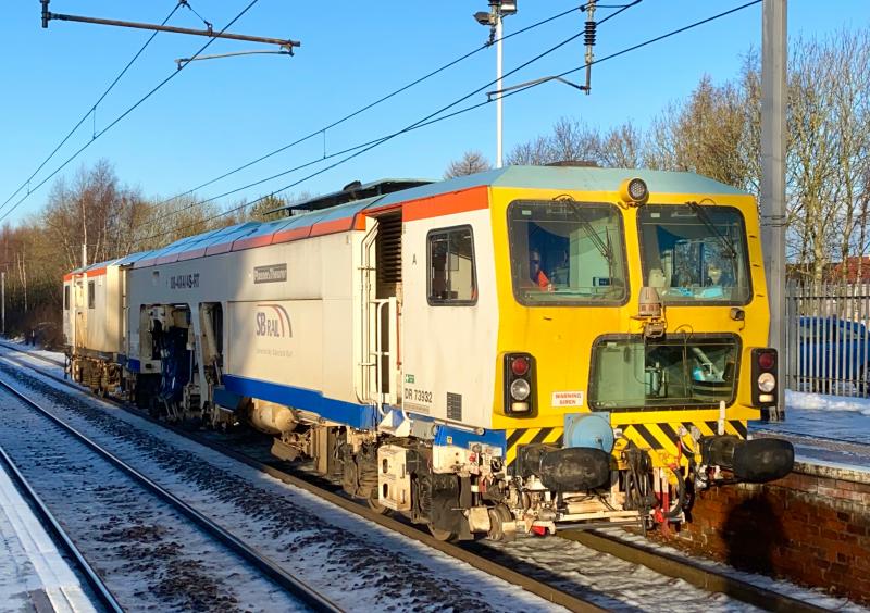 Tamp Into The New Year: My first snap of 2021, shown to be Swietelsky Babcock Rail Tamping Machine DR73932 working 6T46 Rutherglen to Slateford Depot, passing Holytown in rather nice light (04/01/2021) Photo of Tamp Into The New Year