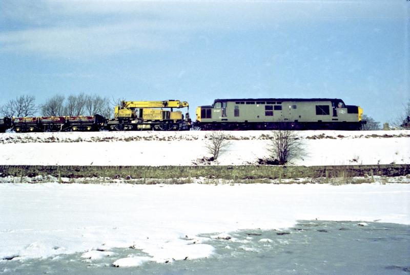 Cupar 1991: 37087 heads up a Works train at Cupar Common at the end of January 1991. Photo of Cupar 1991