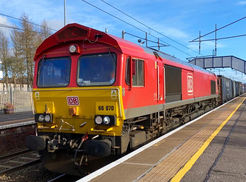 Red Shed to Grangemouth: 66070 in DB Red heads north through Holytown bound for Grangemouth on 21/02/2021. Photo of Red Shed to Grangemouth