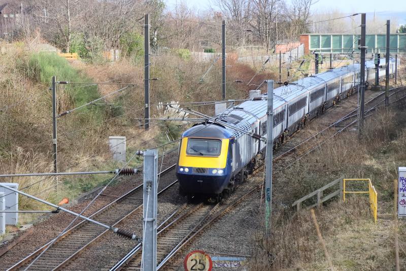 5S01: 43124 + 43148 with two 4 coach sets on 5S01 10.30 Doncaster Works to Haymarket Depot passing the entrance to Craigentinny T&RSMD on 25/02/2021 Photo of 5S01