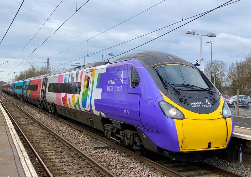 Avanti's Pride and Joy: Wearing its unique trainbow pride livery, Avanti Class 390 no. 390119 coasts through Uddingston station working the 1M12 Glasgow Central to London Euston express on 15/03/2021 Photo of Avanti's Pride and Joy