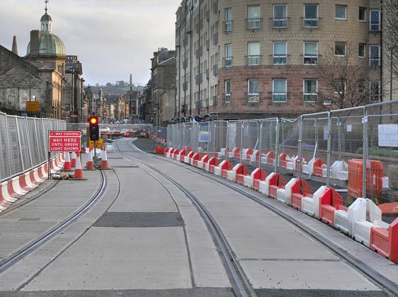 Constitution Street tramline: Looking along the north end of Constitution Street. Leith, towards Calton Hill with double track installed. 27 March 2021. Photo of Constitution Street tramline