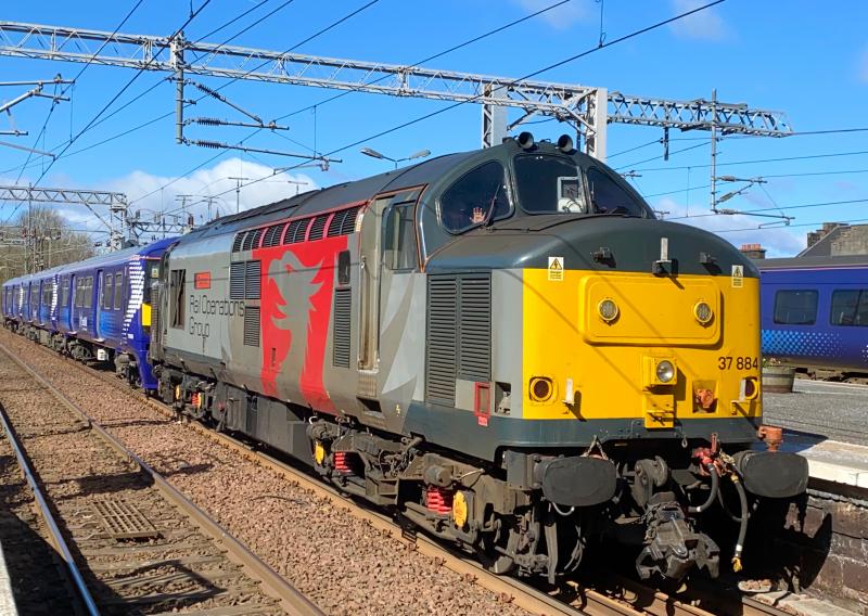 Dusty Drag: With 320320 in tow, ROG Europheonix liveried 37884 is on the approach to Paisley Gilmour Street. It would go on to drop 320320 at Yoker and retrieve 320307 to tow it to Kilmarnock (05/04/2021) Photo of Dusty Drag