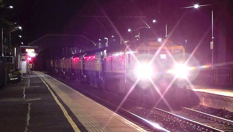 Loram C21-03 'Martin Elwood': DR79251/2/3/4/5/6/7 Loram C21-03 'Martin Elwood' on 6Z03 22:29 Slateford Depot to Slateford Depot returning eastward through Lenzie station at 00:20 on 06/04/2021. Photo of Loram C21-03 'Martin Elwood'