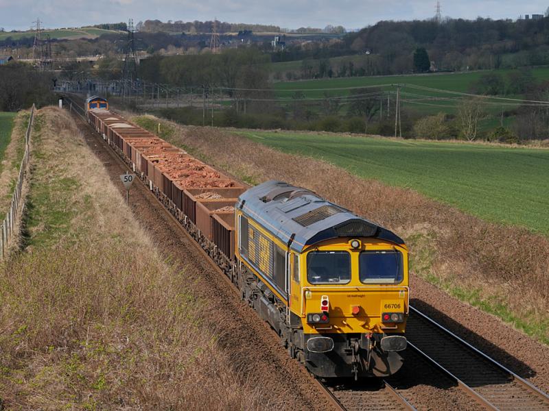6K30 in Fife: 6K30 Laurencekirk - Millerhill ballast nearing Inverkeithing East Junction hauled by GBRf 66770 with 66706 on the rear, on 11 April 2021. Photo of 6K30 in Fife