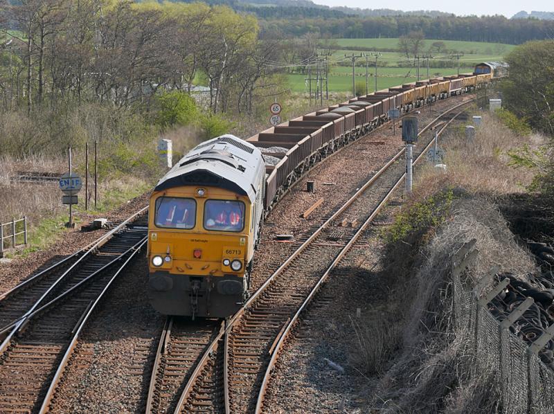 Inverkeithing East ballast: GBRf 66713 passes Inverkeithing East Junction with 6K36 Laurencekirk - Millerhill ballast on 25 April 2021. 66722 is on the rear. Photo of Inverkeithing East ballast