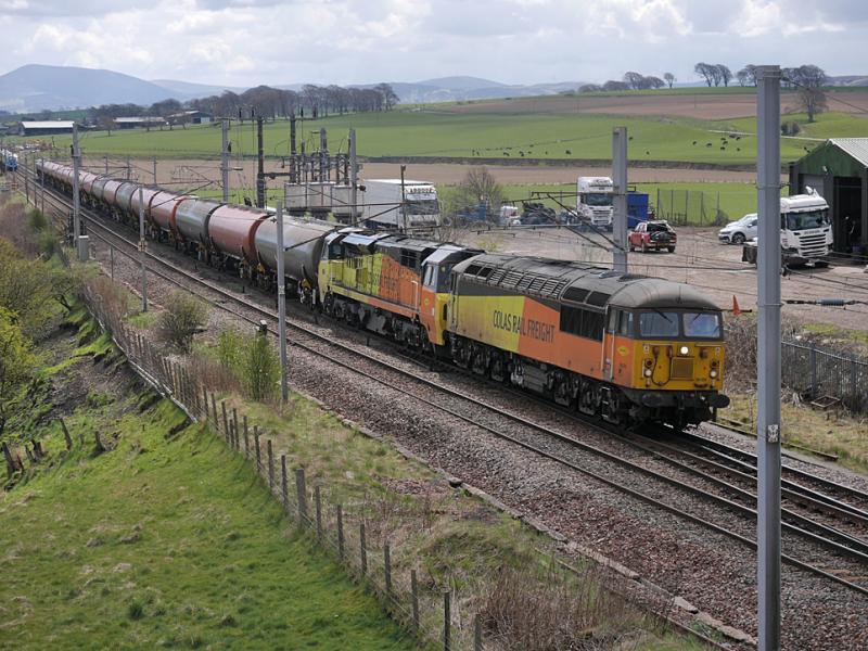 Double Dalston: 56105 with 70817 DIT nears Carstairs South Junction with the Dalston - Grangemouth empties on 30 April 2021. Photo of Double Dalston