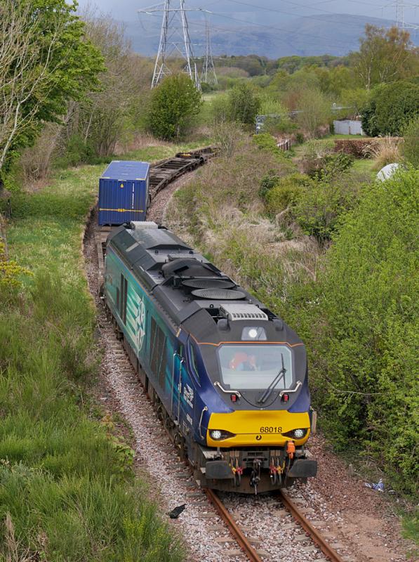 Kincardine 68: 68018 runs through the closed Kincardine station with the diverted 4A13 Grangemouth - Aberdeen intermodal on 1 May 2021. 66422 is out of sight on the rear. Photo of Kincardine 68