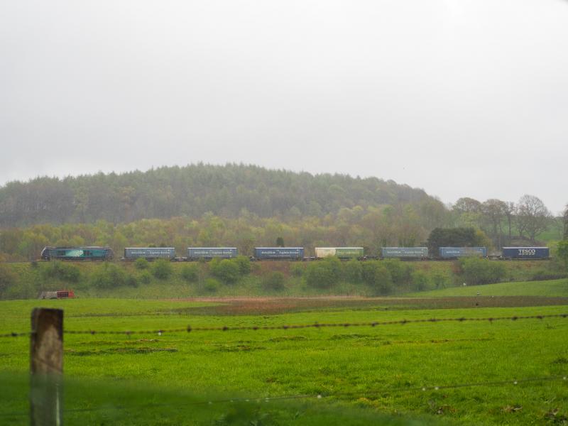 68018 Markinch: 68018 leads a diverted Grangemouth to Aberdeen container train through torrential rain near Markinch on 3 May 2021 Photo of 68018 Markinch