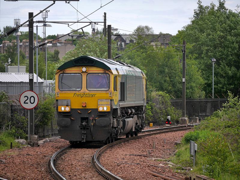 Slateford 66504: Freightliner 66504 nears Slateford Junction with a Millerhill - Coatbridge FLT light engine movement on 4 June 2021. Photo of Slateford 66504