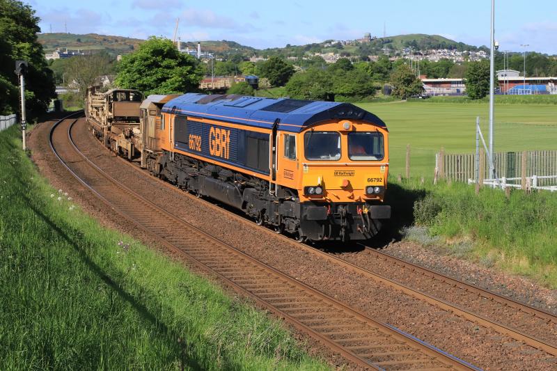6K20: 66792 leading 66725 on 6K20 08.05 Cathcart West Jct to Millerhill empty CWR passing Peffermill Playing Fields on 06/06/2021 Photo of 6K20