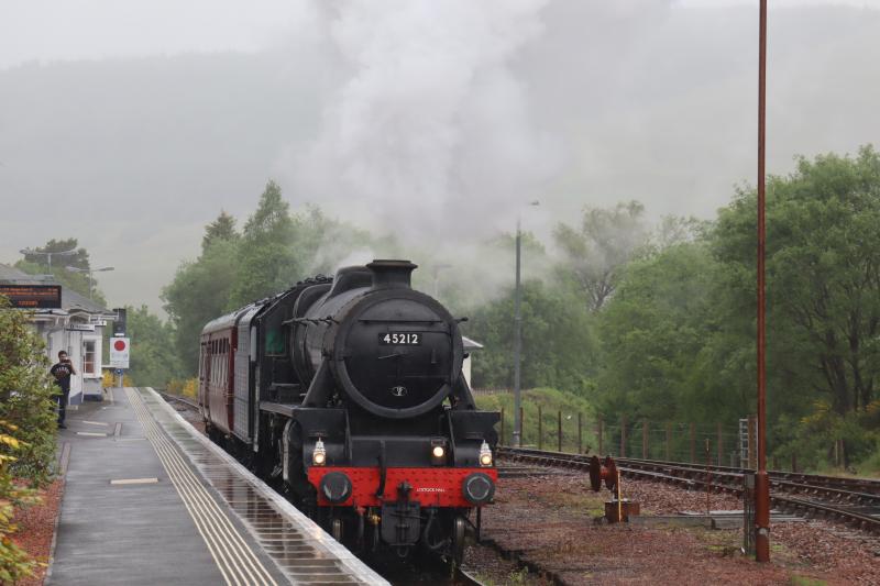45212 @ Crianlarich: 45212 plus WCR coach 35508 departing Crianlarich on today's VST working - 4Z55 to Toton. Reported that 45212 is heading for wheel profiling work. Did not take on any water at Crianlarich. Photo of 45212 @ Crianlarich