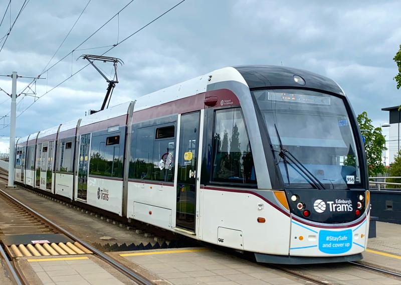 Masked Tram: Edinburgh Tram no. 261 pulls into Edinburgh Park, decorated with a COVID mask printed on the nose to remind customers of the mandatory wearing of face masks on public transport. (04/06/2021) Photo of Masked Tram