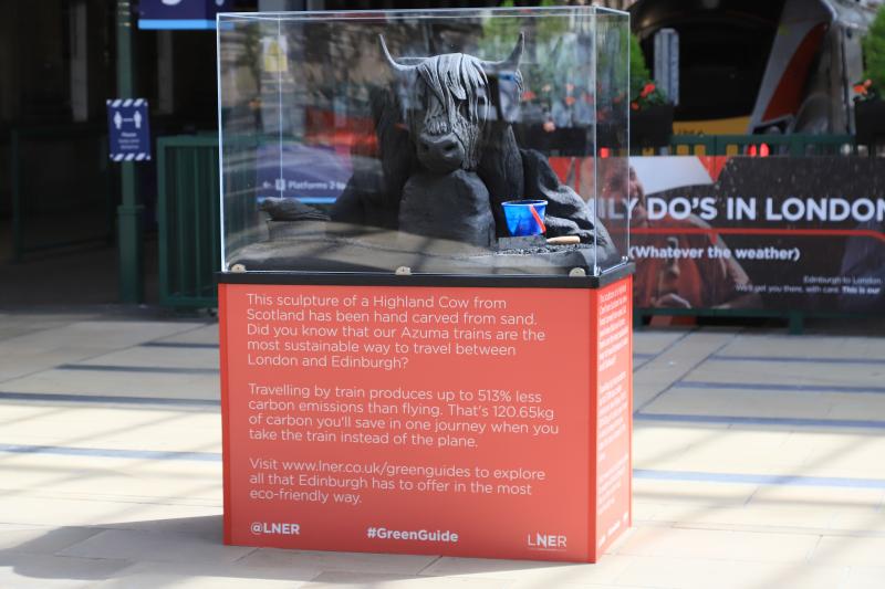Carbon Saving Cow: This appeared in front of Platforms 5 & 6 at Waverley Photo of Carbon Saving Cow