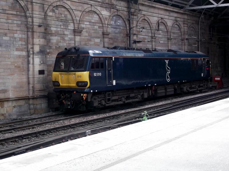 92010 at Edinburgh Waverley: Waiting on its next turn of duty during staff action 92010 is at Edinburgh Waverley on 23rd June 2021. Photo of 92010 at Edinburgh Waverley