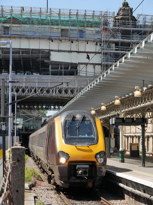 Waverley voyagers: CrossCountry 221129 and 220017 wait at Waverley platform 8 with the 13.05 to Plymouth on 1 July. Major work continues on North Bridge, above. Seen from the car park. Photo of Waverley voyagers