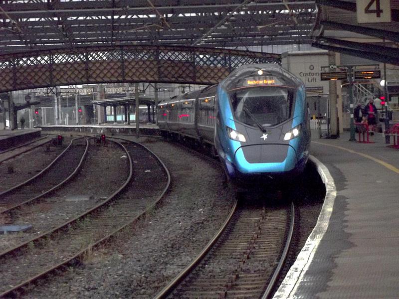397001 at Carlisle: Trans Pennine Express Nova 3 397001 waits at Carlisle with a service to Manchester Airport from Edinburgh on 10th July 2021. Photo of 397001 at Carlisle