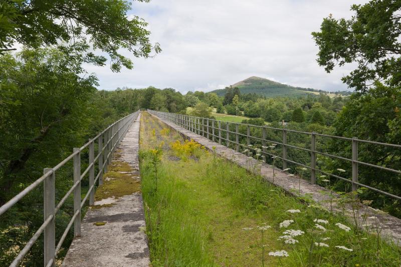 Leaderfoot viaduct: Leaderfoot viaduct at track level through the fence Photo of Leaderfoot viaduct