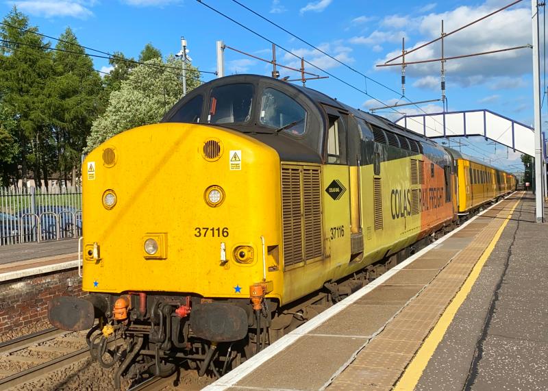 Full Sun Growlers: Nearing journey's end, Colas 37116 heads the 1Q74 Carlisle - Mossend monthly PLPR via the G&SW, WCML, the sub and Shotts through Holytown in full evening sun, classmate 37219 on the back. (07/07/2021) Photo of Full Sun Growlers