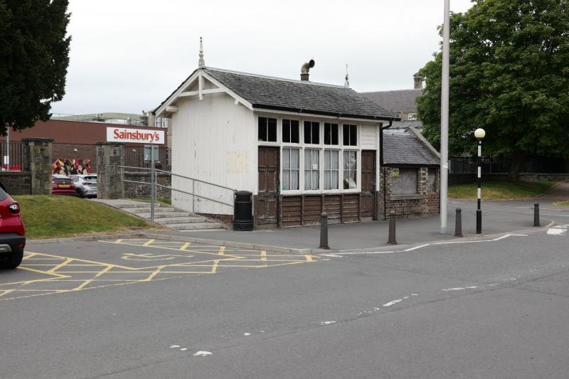 Peebles East: The goods shed at Peebles East station, now the town car park.
The passenger station is the main road, there's a few signboards about to record the fact. Photo of Peebles East