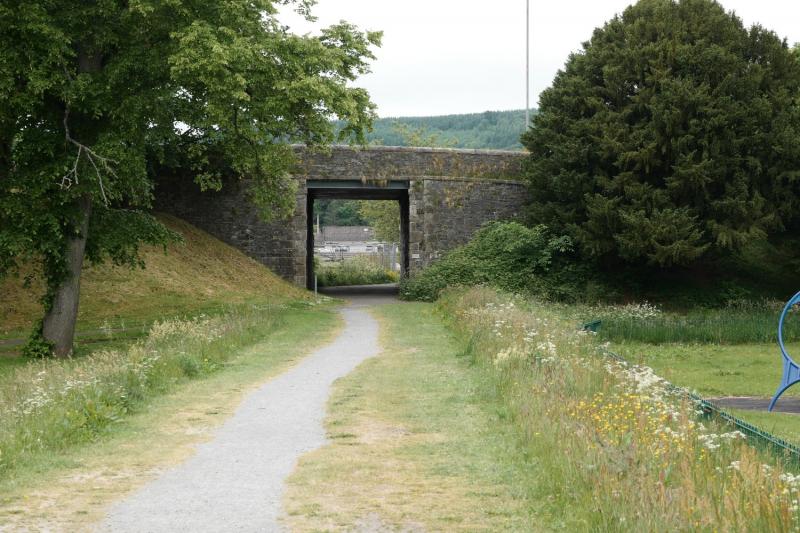 Peebles West: The railway 'aperture' in the river bridge at Peebles, looking west.
The west station site lies beyond. Photo of Peebles West