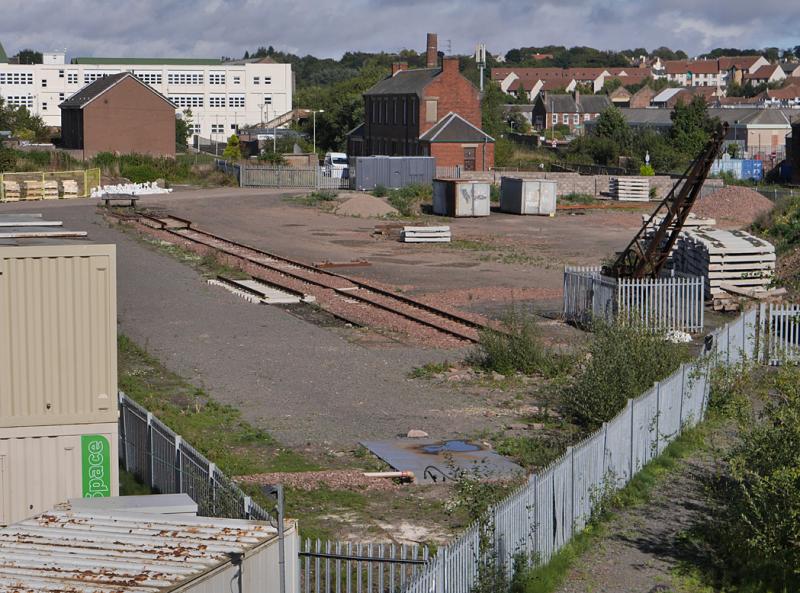 Arbroath Goods Yard: Looking north over the former goods yard at Arbroath on 18 September 2021. Permanent way materials are stored here along with a new length of disconnected siding. Photo of Arbroath Goods Yard