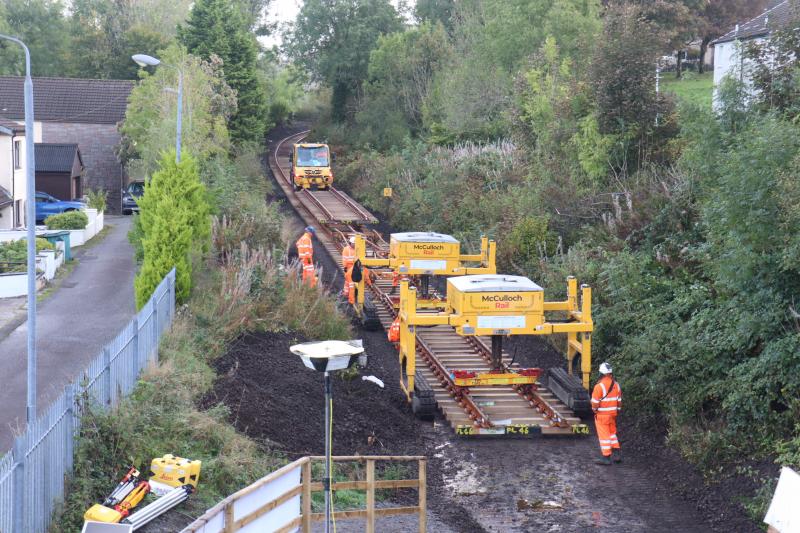 Soroba Track Renewal - Panel Installation: This is the 2nd last 60' panel being dropped into place this morning having been railed down from Connel. Photo of Soroba Track Renewal - Panel Installation