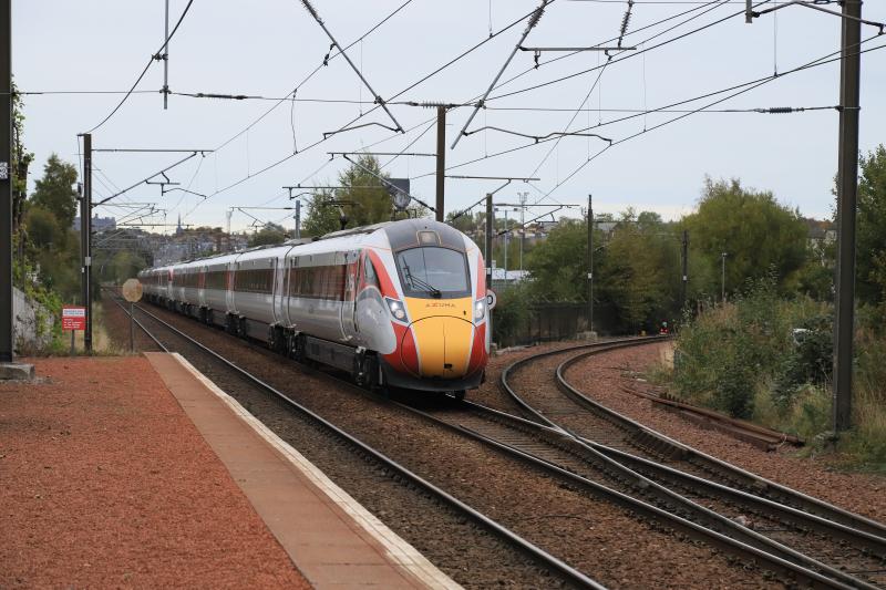1E23: 801108 + 800203 on 1E23 14.23 Edinburgh to Kings Cross passing Slateford Jct on 16/10/2021 not diverted through The Sub. Photo of 1E23