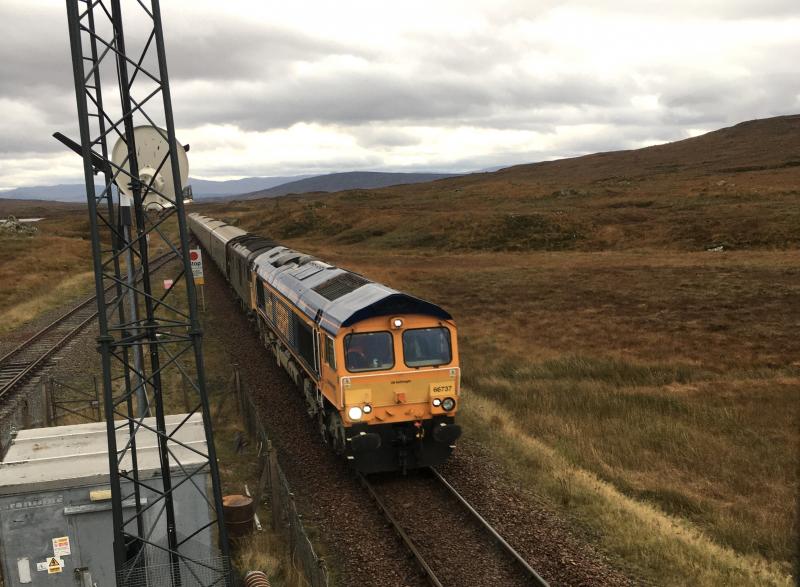 Caledonian Sleeper at Corrour: 66737 slowing for the Corrour stop, where it disgorged
a group of hill walkers apparently out on the last
mountain climb of the season. 23.10.2021 Photo of Caledonian Sleeper at Corrour
