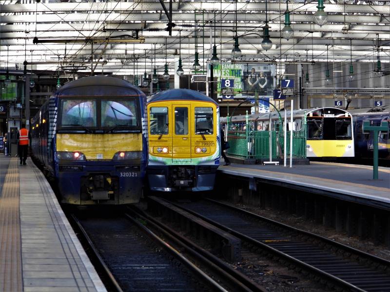 230001 and 799201 04/11/21: 230001 battery powered and 799201 hydroflex sit side by side in platforms 7 and 8 of Glasgow central at 1300 on 04/11/21 in conjunction with running special trains for COP26 Photo of 230001 and 799201 04/11/21