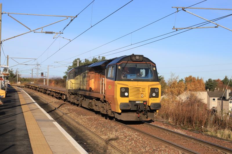 6K07: 70801 on 6K07 07.35 Garnqueen North Jct to Carlisle passes Newcraighall Station before running round in Millerhill yard on 15/11/2021 Photo of 6K07