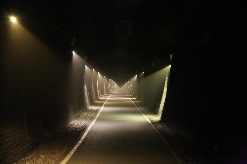 Combe Down Tunnel: Note the change in gradient in the lights from level to 1 in 100 falling. Photo of Combe Down Tunnel