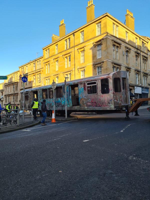 NY subway in Glasgow: NY subway being transported to Bottanic Gardens station in Glasgow for filming of Batgirl. Photo of NY subway in Glasgow