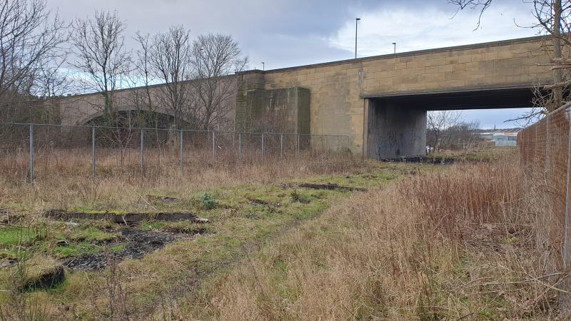 Bawbee Bridge Leven: After recent discussions I had a drive along to Leven on Sunday afternoon and took a phone shot through the Railtrack fence of the two different spans crossing the railway and river. Photo of Bawbee Bridge Leven