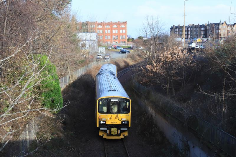 2Q08: 950001 on 2Q08 09.17 Slateford Depot to Falkland Yard on the Leith Branch near Craigentinny Depot on 04/02/2022 Trees cut down since previous photo when leaves touched the unit. Photo of 2Q08
