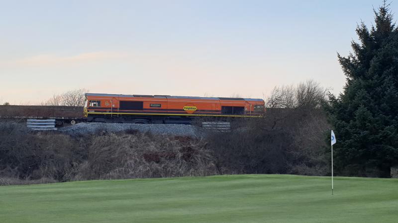 Levenmouth progress: 66503 is seen by the 8th green at Thornton Golf Club at the top end of the Levenmouth branch. It had arrived just after midnight with a train of concrete sleepers. Photo of Levenmouth progress
