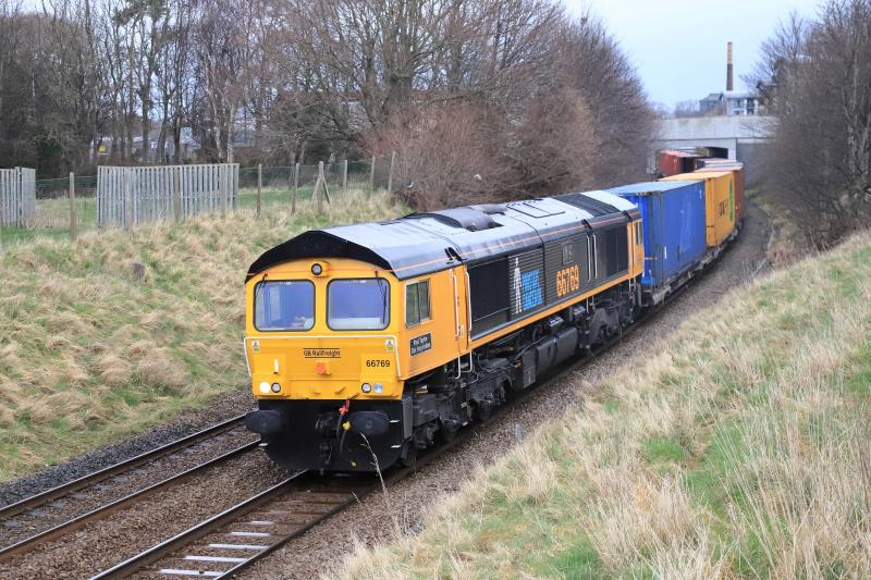 4S69: 66769 on 4S69 06.06 doncaster Iport to Elderslie passing Peffermill Playing Fields on 03/03/2022 Black Livery with Prostate Cancer Logo Photo of 4S69