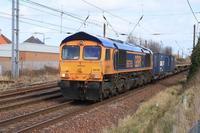 4S69 Fresh Air: 66765 on 4S69 06.06 Doncaster Iport to Elderslie approaching Prestonpans Station on 17/03/2022. The load was 2 Shorter containers 20ft long not the usual 40ft. Photo of 4S69 Fresh Air