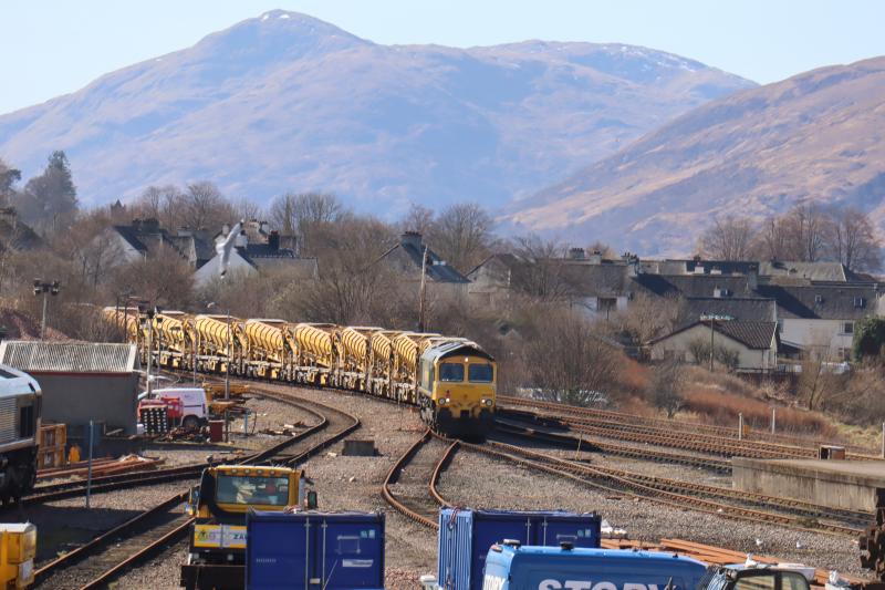631W Propelling out of FW Yard: FL 66539 backing out of FW Yard at lunchtime today having arrived overnight from Millerhill. Train is a Rhomberg Sersa Materials Handling / Hopper Wagons (15). Photo of 631W Propelling out of FW Yard