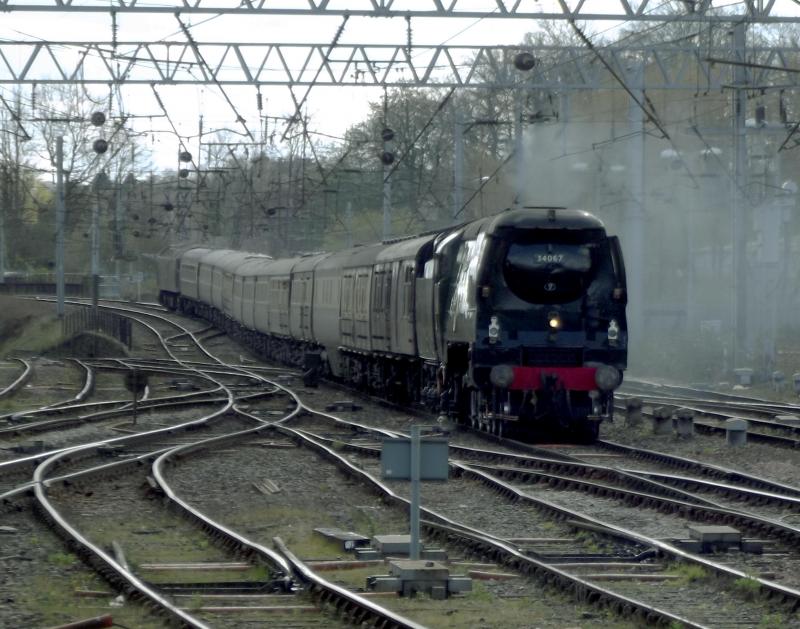 34067 at Carlisle: Ex SR Battle of Britain 34067 Tangmere arrives at Carlisle with the Northern Belle Settle and Carlisle Steam Special from York on 2nd April 2022.57316 is on the rear. Photo of 34067 at Carlisle